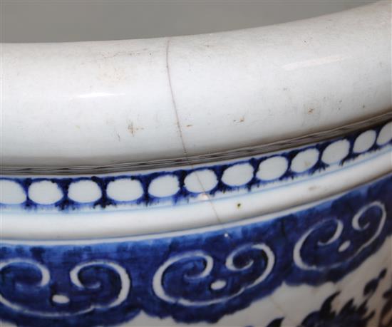 A large Chinese blue and white fish bowl, cracked, diameter 58cms